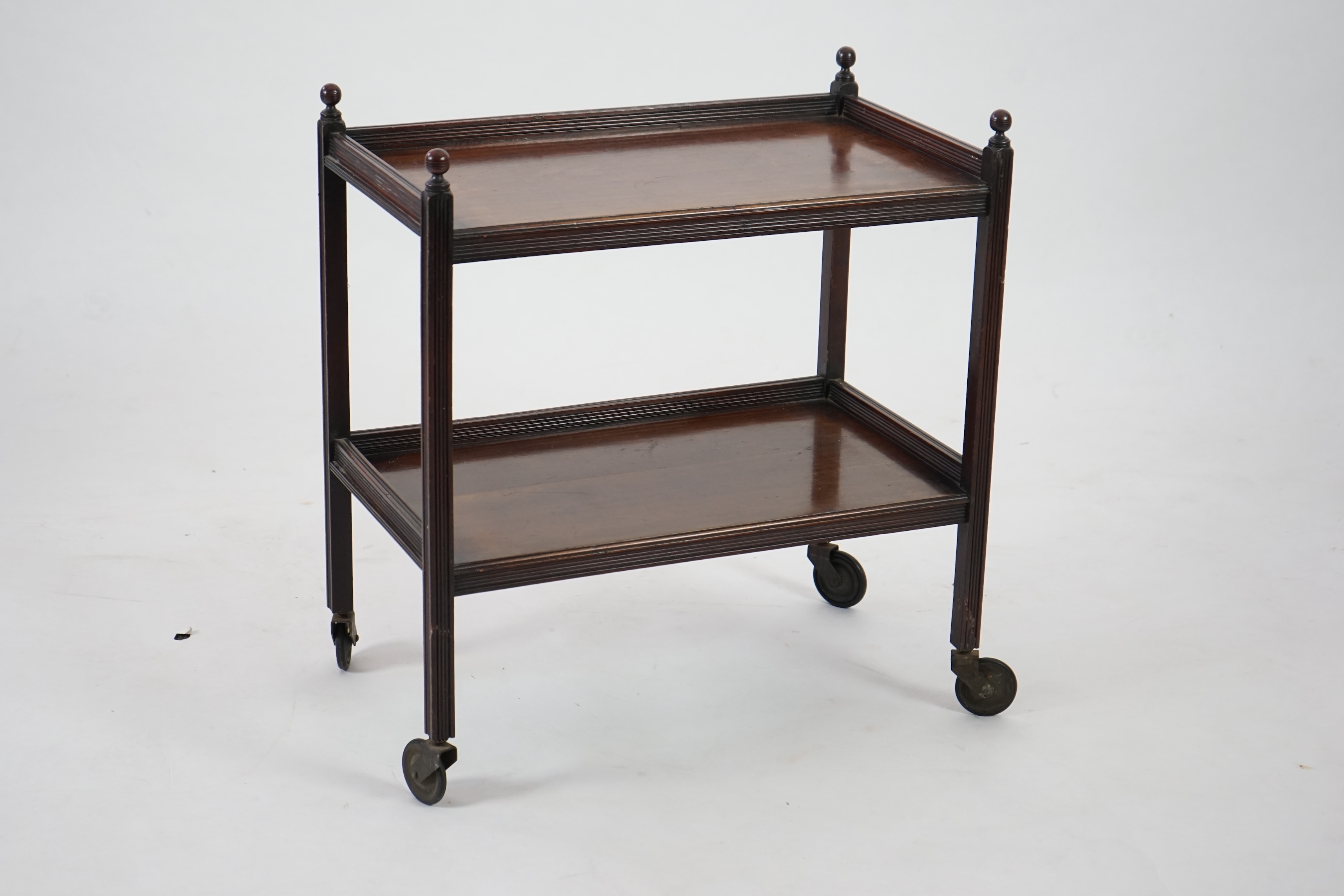 An Edwardian mahogany two tier trolley